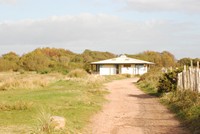 [Looking towards the visitor centre at Dawlish Warren]