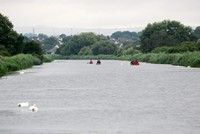 [Rowing on the canal]