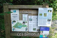 [Public notice board on the path at Stover]